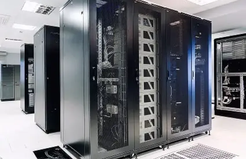 IT infrastructure inside a server room with network servers and equipment.