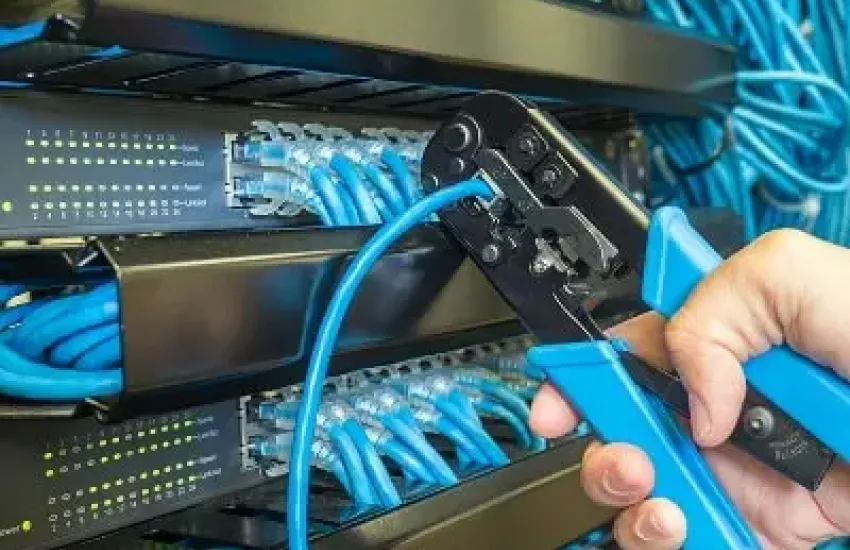 Network cable crimping during installation or maintenance of communication lines.